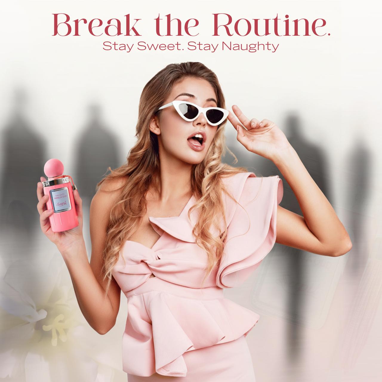 Stylish woman using Sapil Naughty Vanilla Oud pink perfume sweet and naughty vibe