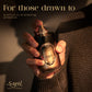 Hand holding Sapil Ombre Smoky Quartz luxury perfume bottle, showcasing quiet elegance and long-lasting warm fragrance